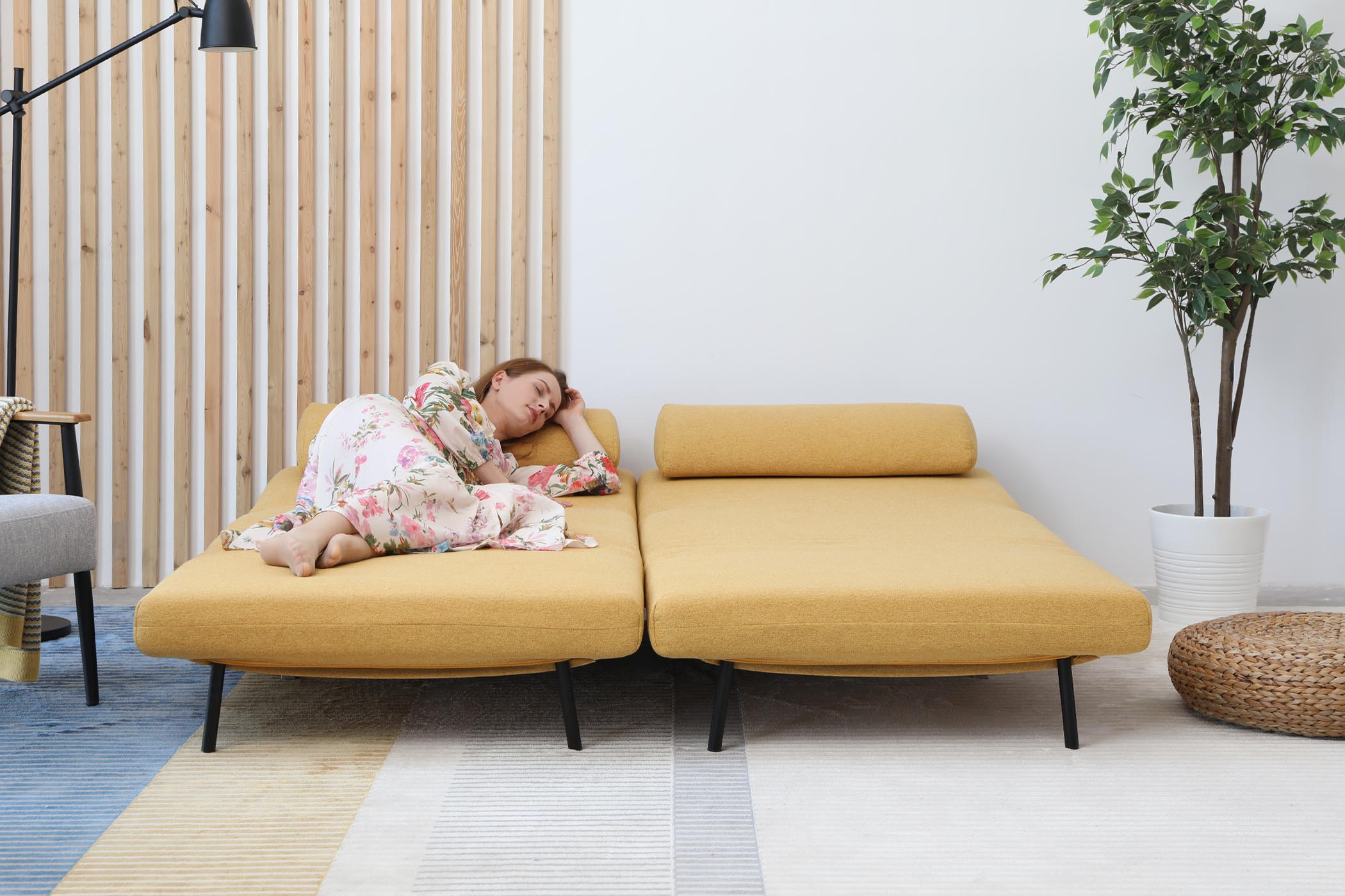 model sleeping on one side in living room scene