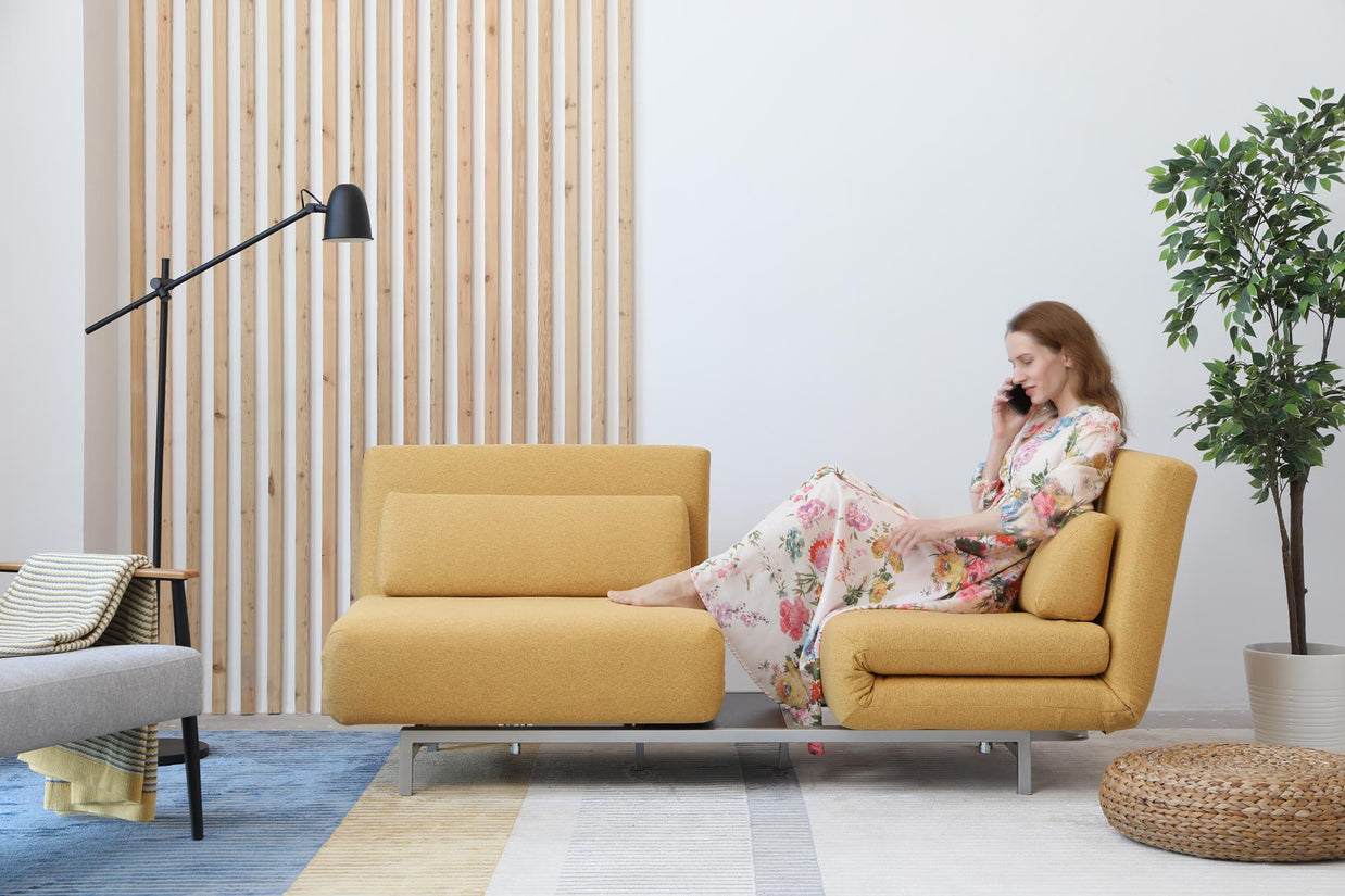 model sitting on one side in living room scene