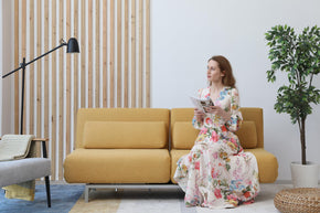 model sitting on one side in living room scene