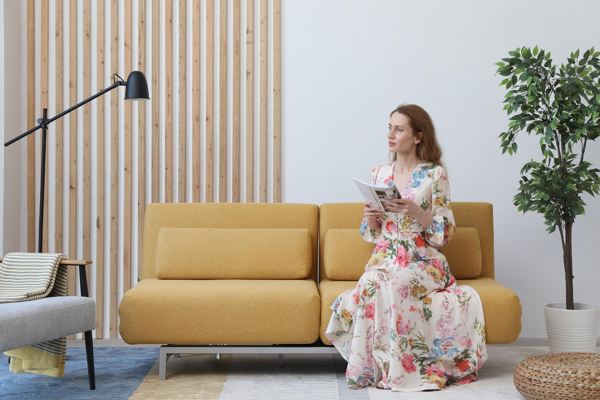 model sitting on one side in living room scene