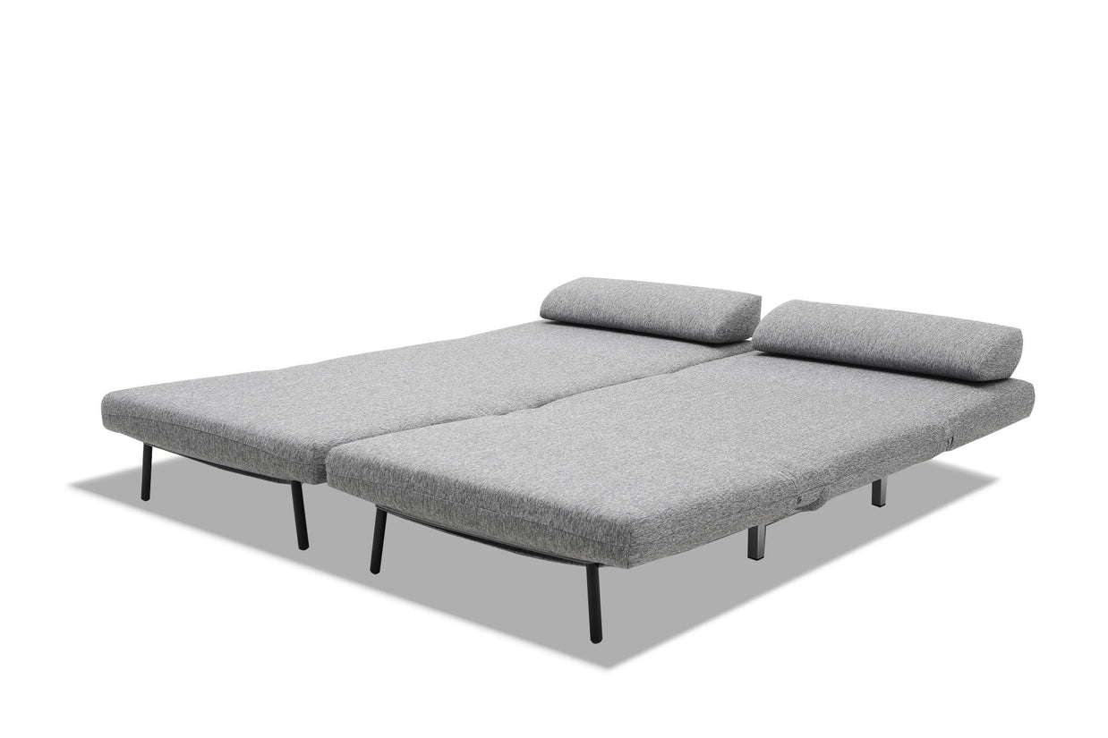 sofa bed in bed mode- side view on white background