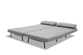 sofa bed in bed mode- side view on white background