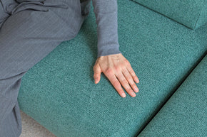 detail of touching on sofa bed