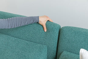 detail  of touching on sofa bed