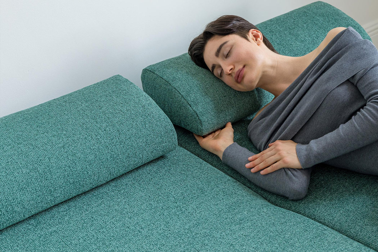 detail model sleeping on sofa bed