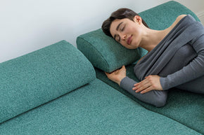 detail model sleeping on sofa bed