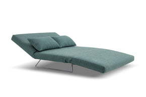 sofa bed in lounge mode- side view on white background