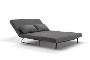 sofa bed in lounge mode- side view on white background