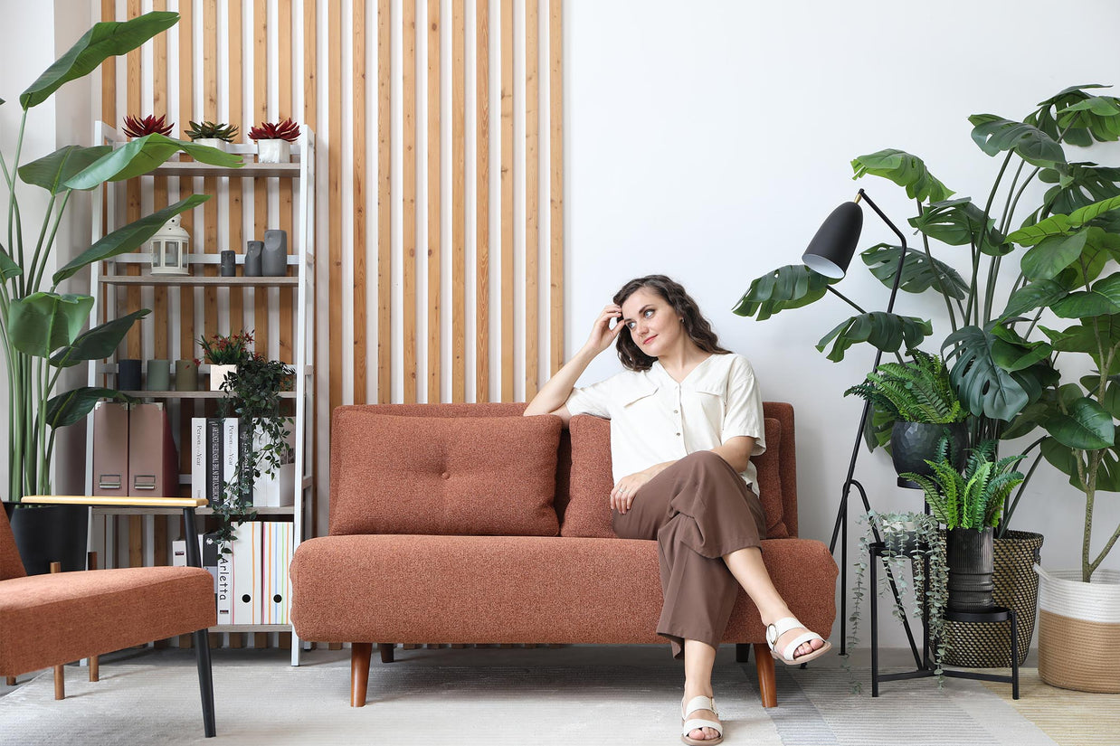 model sitting on the sofa bed in living room