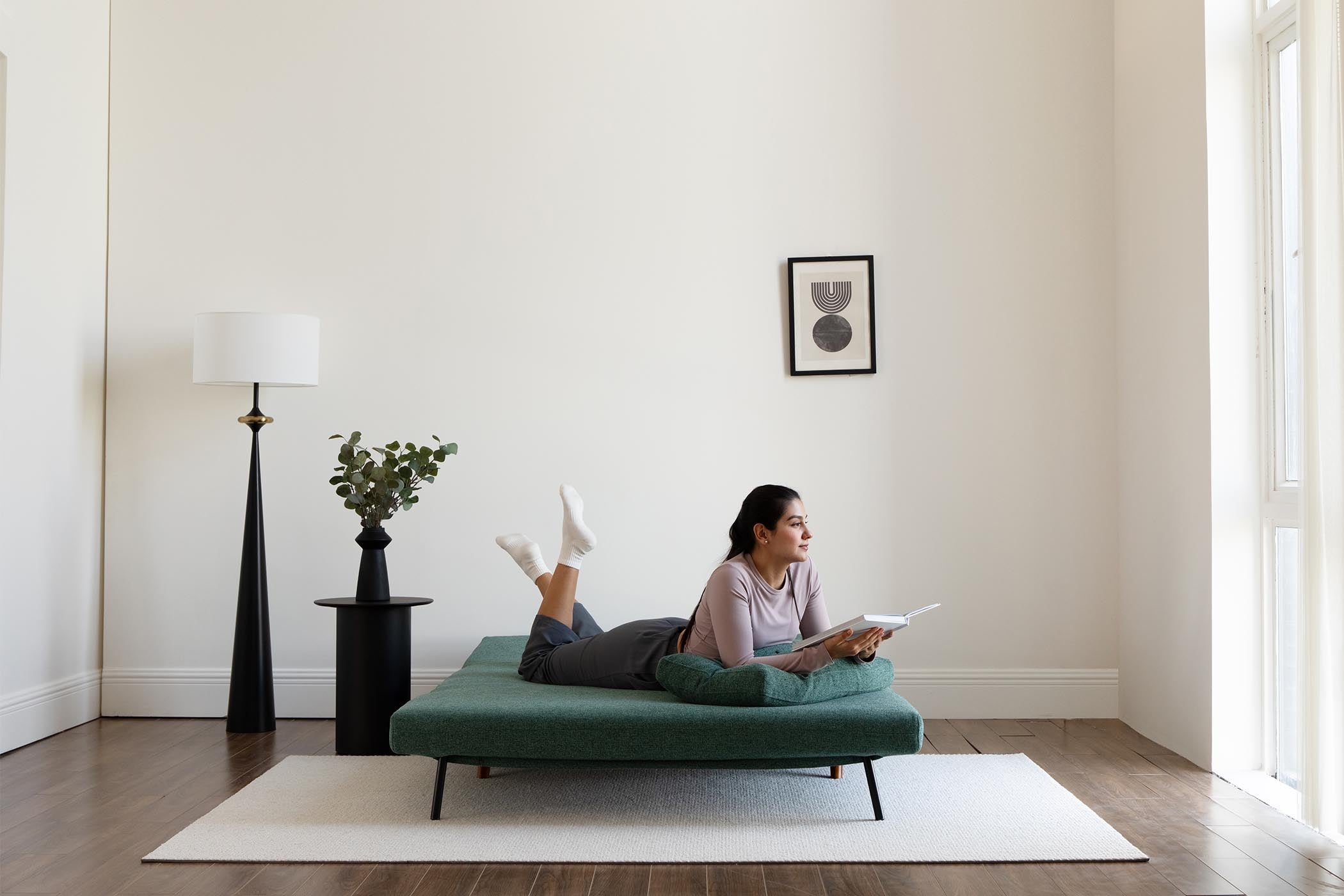model lying on bed scene display